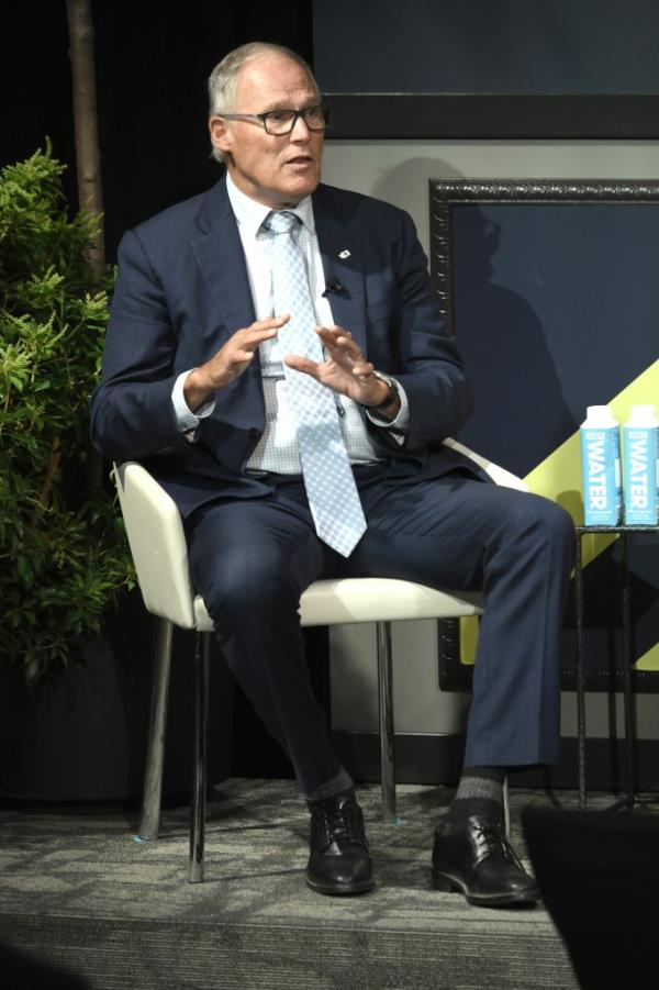 Washington State Governor Jay Inslee delivering a speech during the 2024 Forbes Sustainability Leaders Summit in New York City.