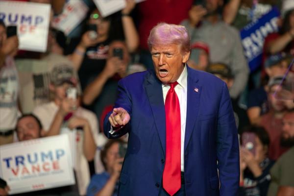 Former President Donald Trump, the Republican presidential nominee for 2024, pointing his finger at a campaign rally at Ed Fry Arena, Indiana.